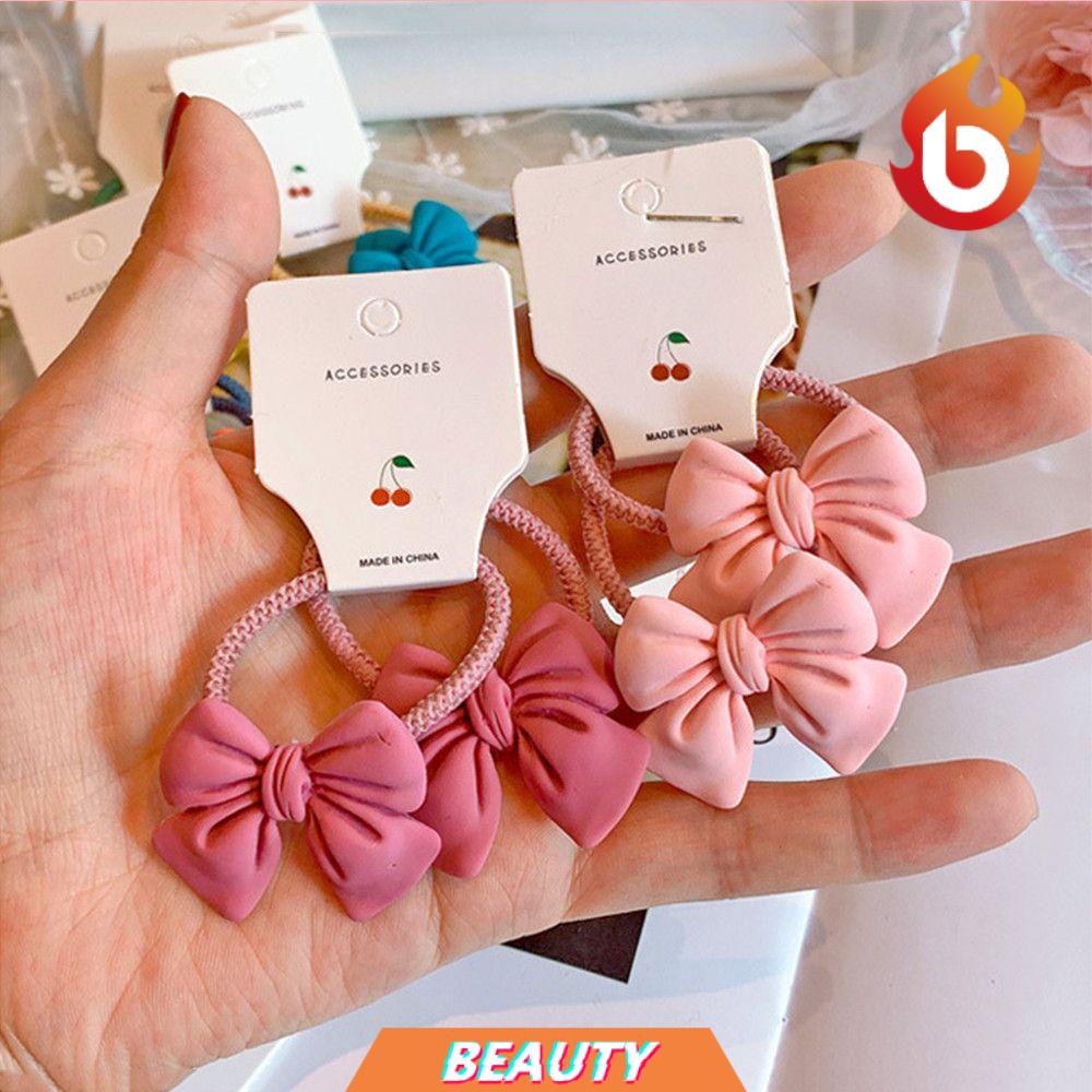 Set 2 Dây Cột Tóc Nơ Co Giãn Nhiều Màu Dễ Thương Cho Bé Gái
