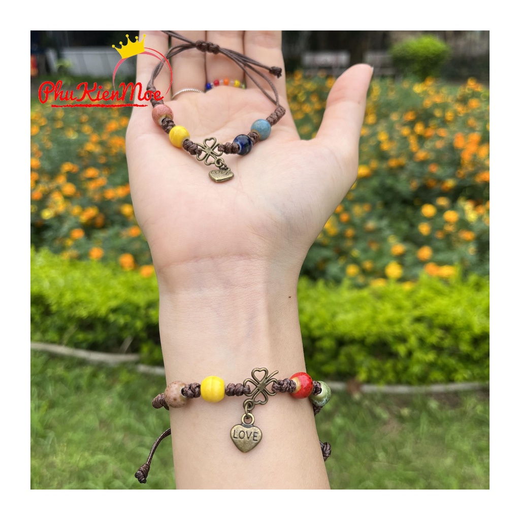 Vòng tay dây rút hạt thổ cẩm hình chiếc lá may mắn gắn tim handmade PhuKienMoe