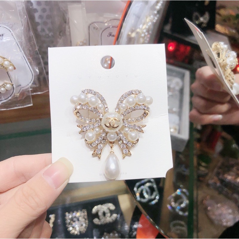 Tag cai áo hình nơ xinh xắn