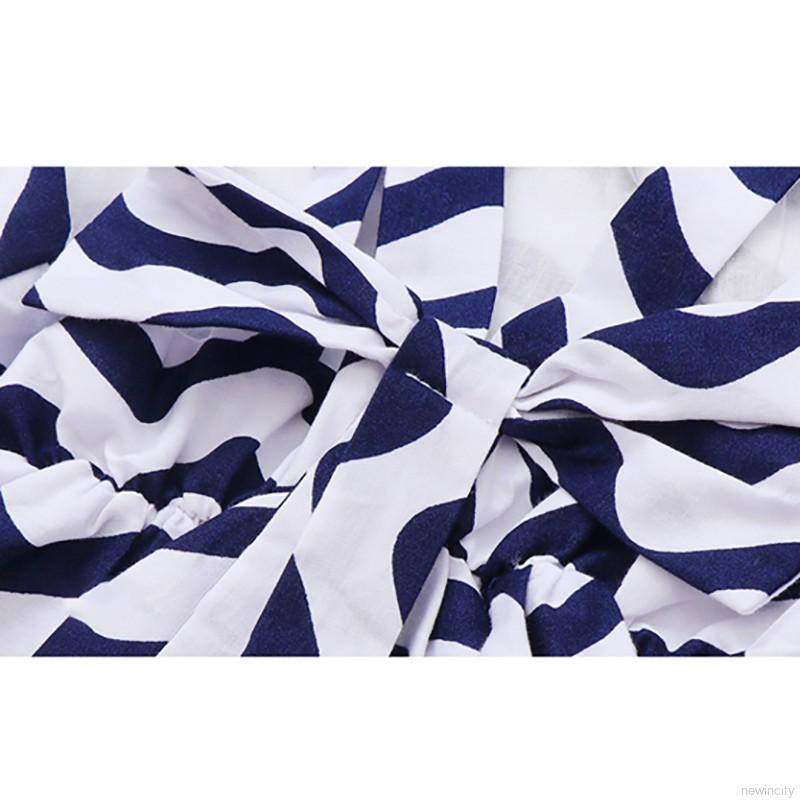 Đầm sát nách hở lưng họa tiết lượn sóng cho bé gái