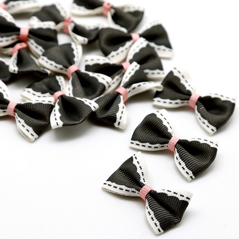 Set 25/ 50 nơ bằng vải satin 4x2.5cm nhiều màu sắc dùng để trang trí đồ thủ công