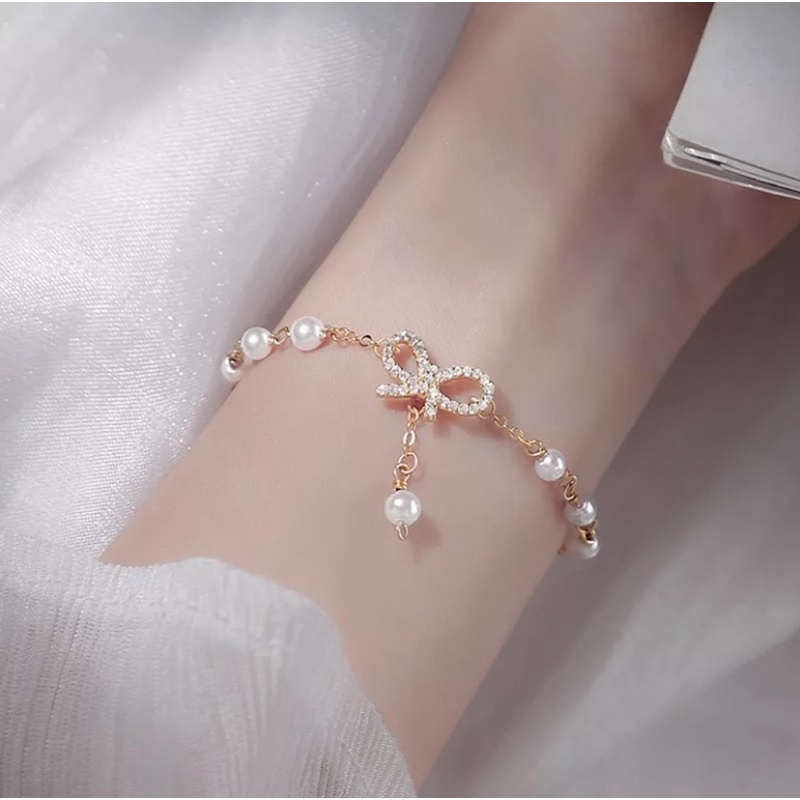 Vòng tay ngọc trai nhân tạo hình nơ đính đá phong cách Hàn quốc cho nữ, lắc tay ngọc trai