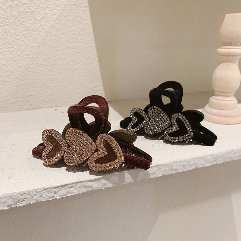 Cặp tóc nhung đính hạt sáng lấp lánh