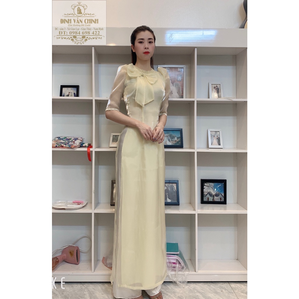 Áo dài tơ sống nơ ngực điểm trai full cổ màu da sáng