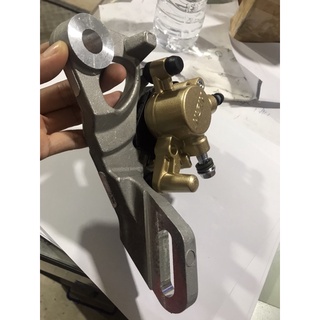Củ dầu sau exciter 150