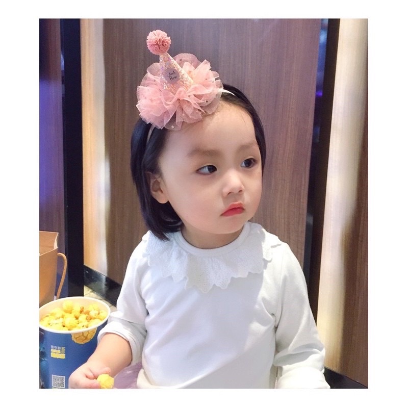 Cái tóc cho bé kiểu mũ sinh nhật