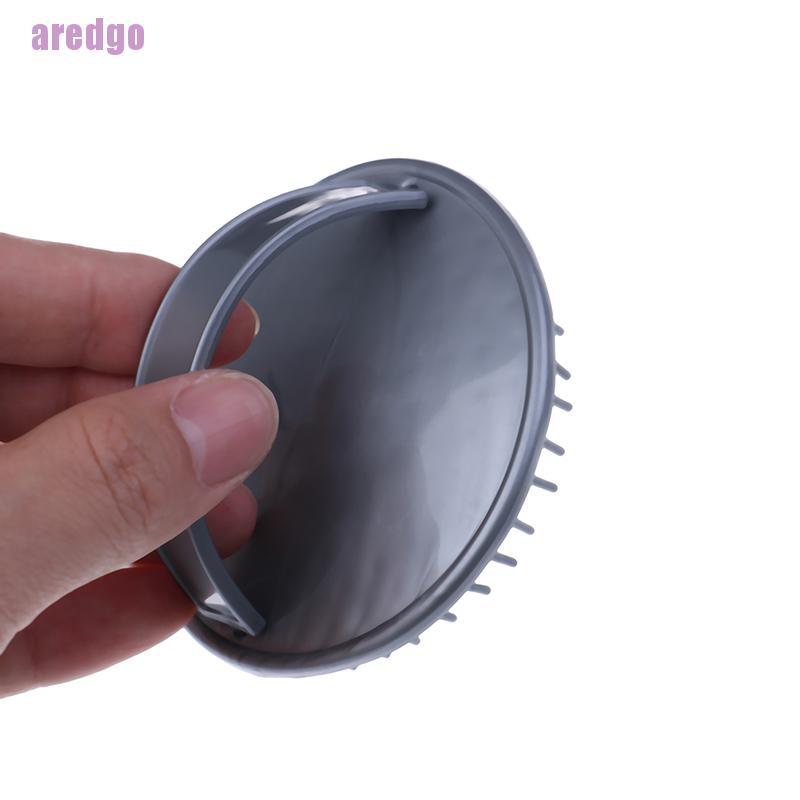 Lược massage da đầu Aredgo bằng silicon chống trượt tiện dụng và nhỏ gọn