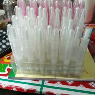 Vỏ hủ dạng bút lông đựng  dầu dừa