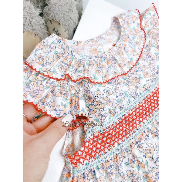 Đầm hoa nhí cổ sen smock