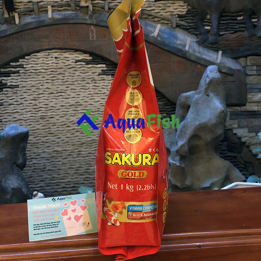 Thức Ăn Cho Cá Koi, Cá Vàng Sakura 35% Túi 1kg (Giúp cá nhanh lớn, tăng đề kháng, màu sắc cho cá)