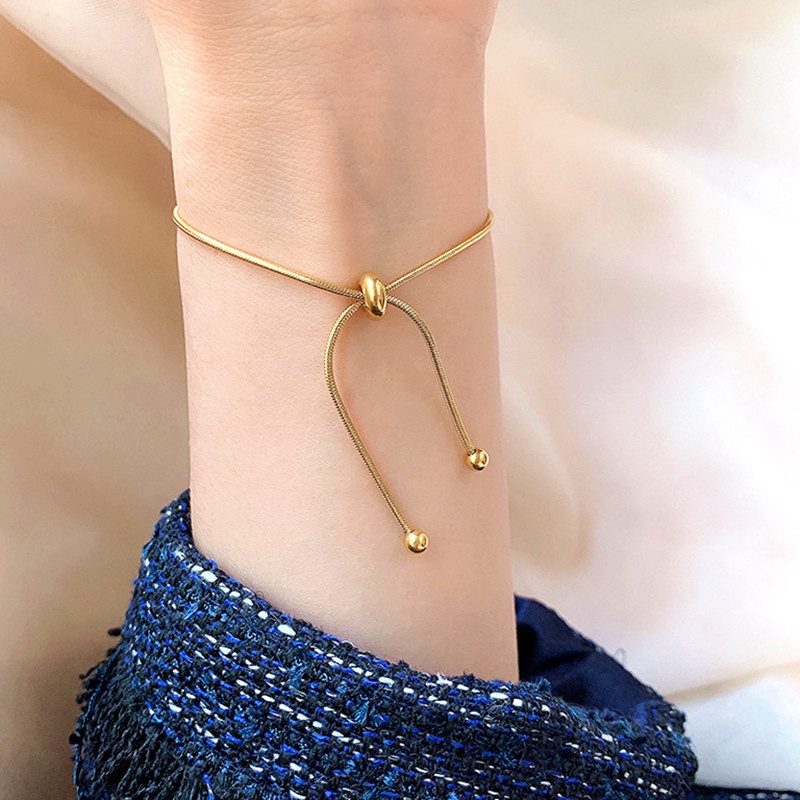 Lắc tay titan nữ 100% TITAN NGUYÊN CHẤT KHÔNG GỈ vòng tay vàng thiết kế đơn giản kiểu dáng rút sợi thời trang 2021