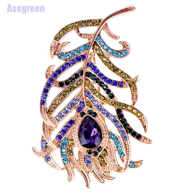 Ghim cài áo hình lông công đính đá pha lê sang trọng