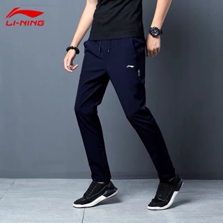 Quần gió lining nam
