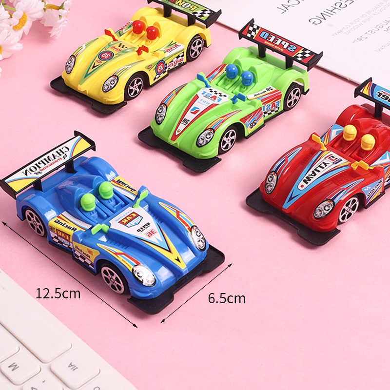 Xe đua F1 đồ chơi cho bé chạy dây cót