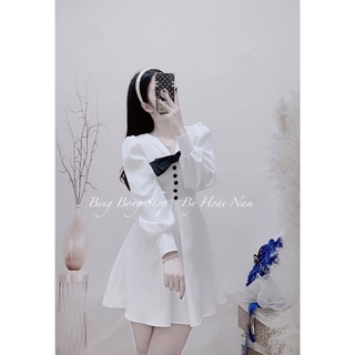 Váy trắng nơ đen