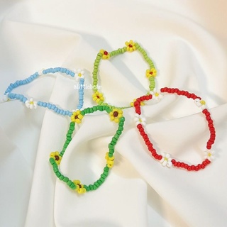 Vòng tay hạt cườm handmade hoa cúc Daisy