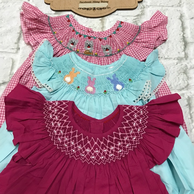 Đầm smock xích bé gái