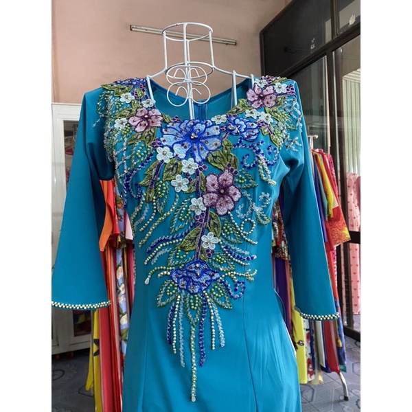 áo dài lụa xanh đá