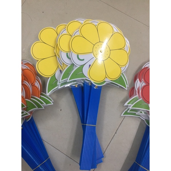 Hoa trắc nghiệm 8 cánh ép plastic xoay được