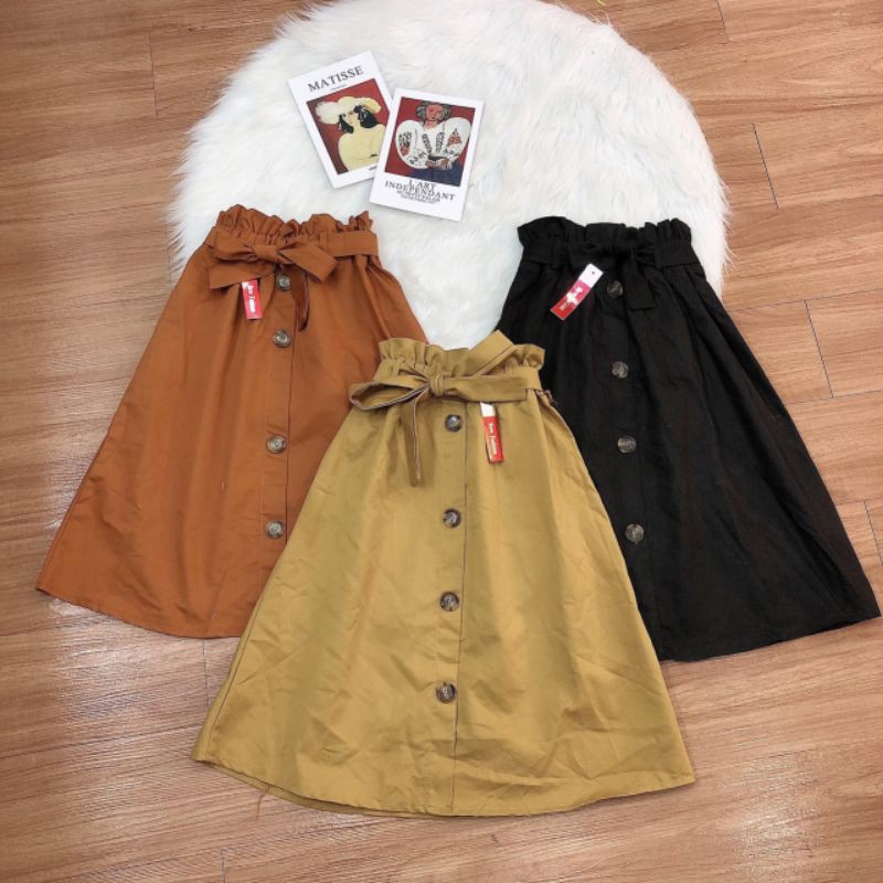 Chân váy chữ A kèm dây thắt nơ dài tới gối sang chảnh. | BigBuy360 - bigbuy360.vn