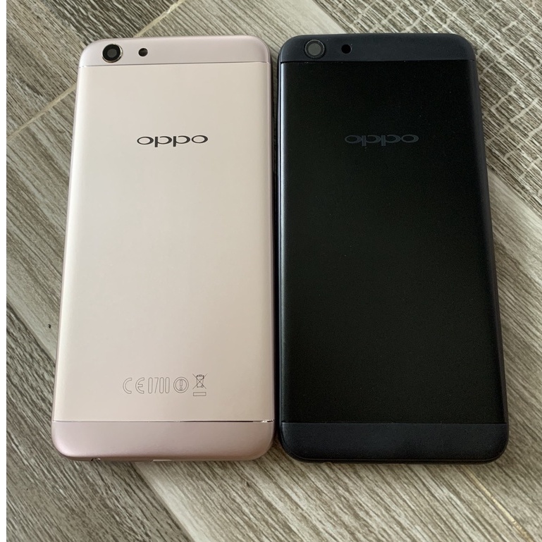 bộ vỏ oppo f3 gồn xương và lưng nút bấm,zin dẹp