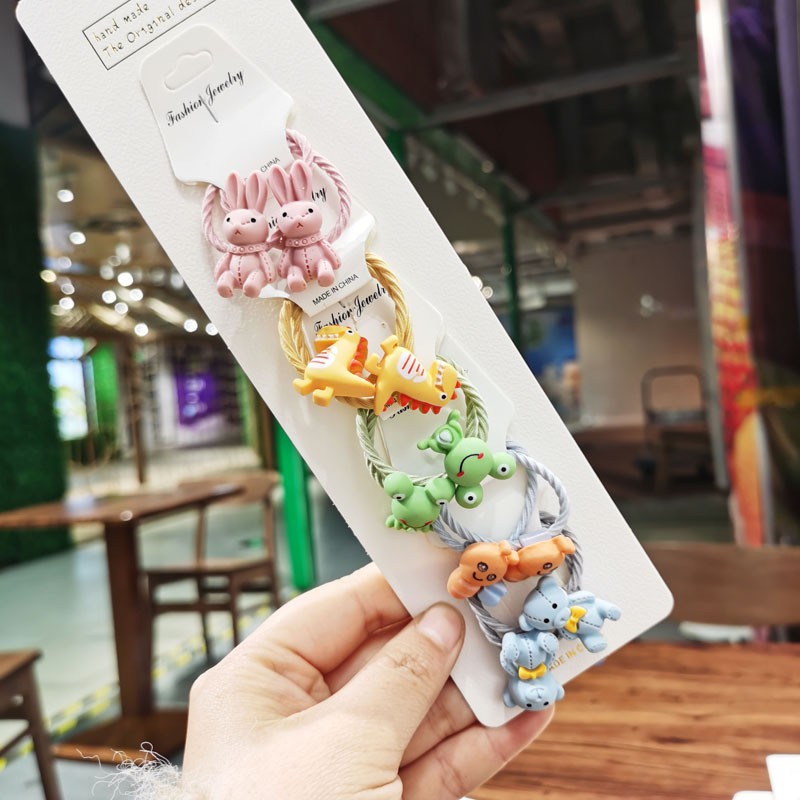 Buộc tóc hoạt hình cho bé