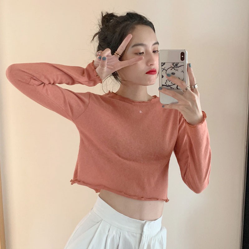 Áo sweater nữ tay dài dáng rộng màu trơn | BigBuy360 - bigbuy360.vn