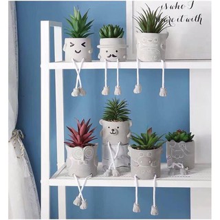 Chậu hoa gốm mặt thú chân dài