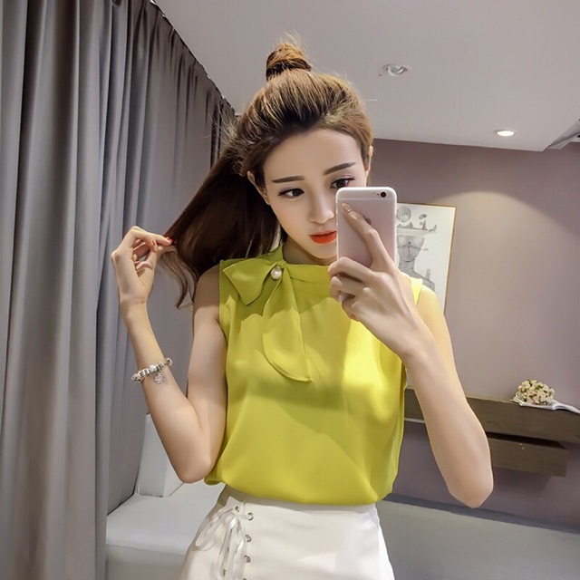 Sơmi cổ nơ sát nách dễ thương