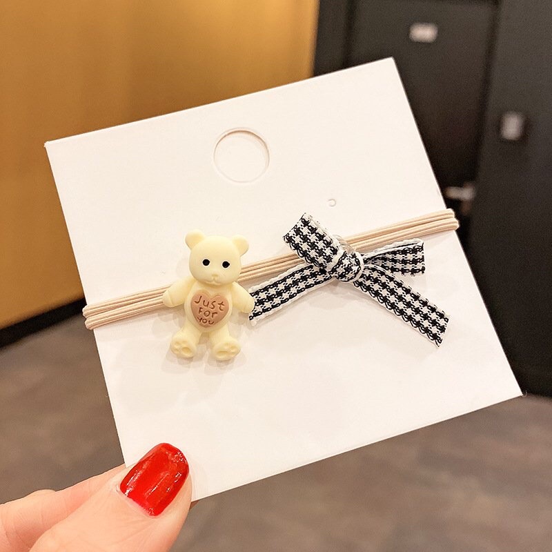 Buộc tóc gấu phối nơ dễ thương