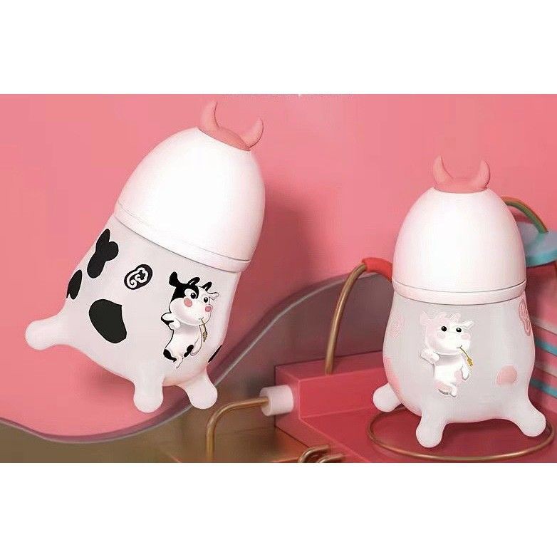 ( ẢNH THẬT ) Bình sữa con bò silicon 180ml và 260ml 2 trong 1 vừa là bình sữa vừa là ngậm nướu cho bé siêu tiện dụng.