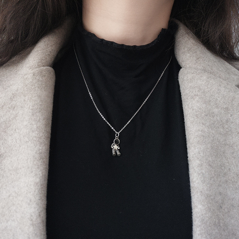 Vòng cổ MAYEBE LAVEND hình phi hành gia độc đáo phong cách Hàn Quốc