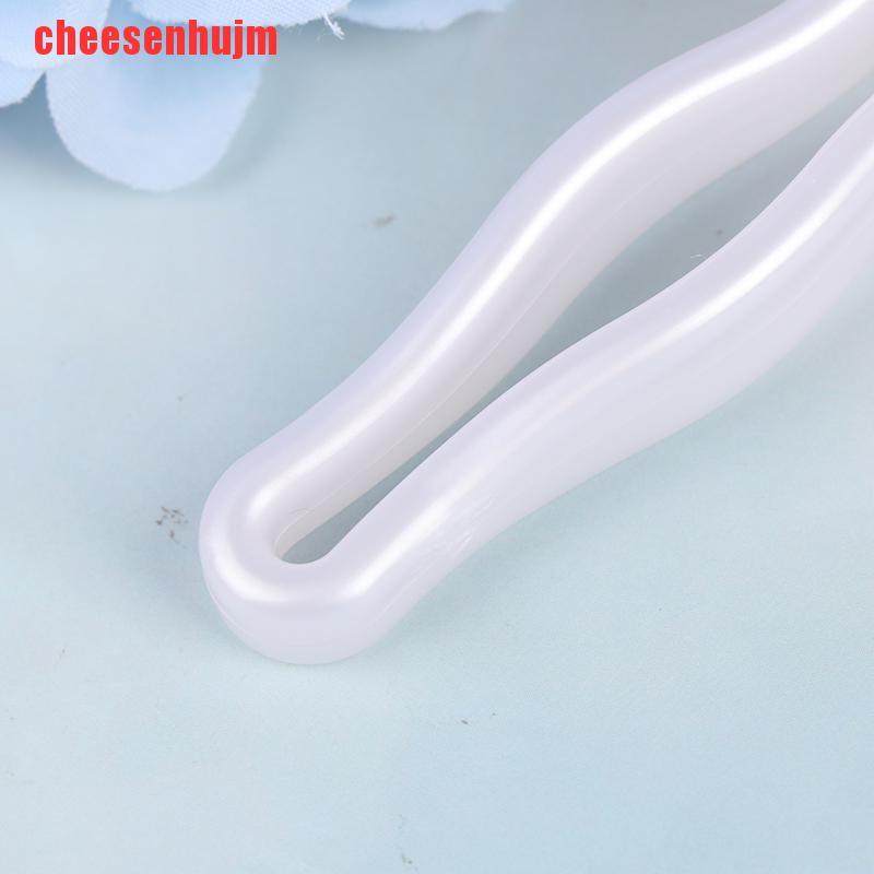 Cây Lăn Mát Xa Mặt Làm Thon Gọn Hình Hoa Mận