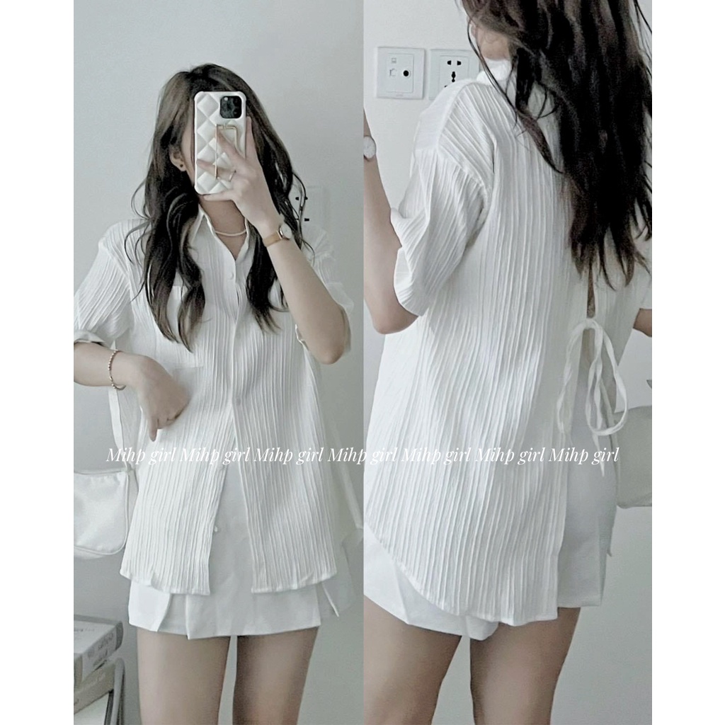 Áo sơ mi form rộng, tay ngắn xẻ tà vải xốp gân