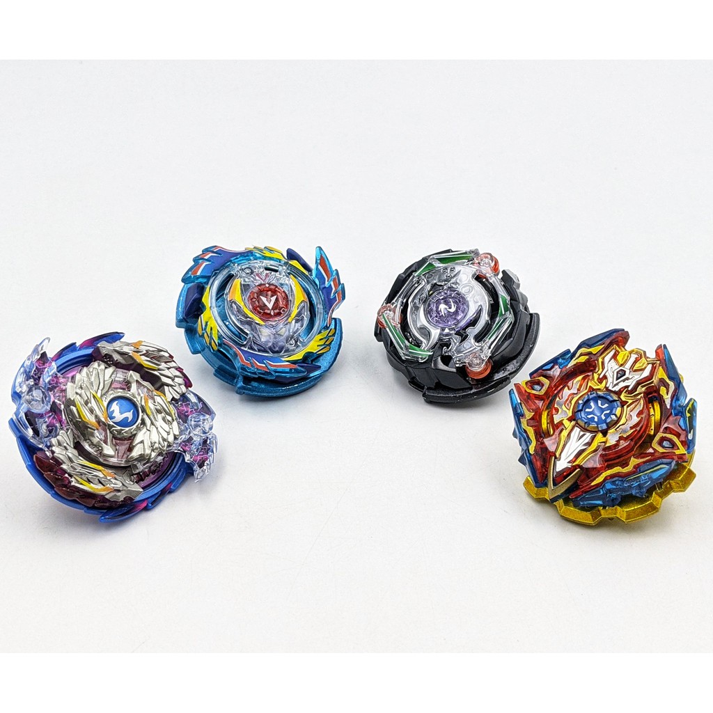 Bộ 4 Con quay BeyBlade + 3 Tay phóng + Sàn đấu - Con quay vòng xoay thần tốc