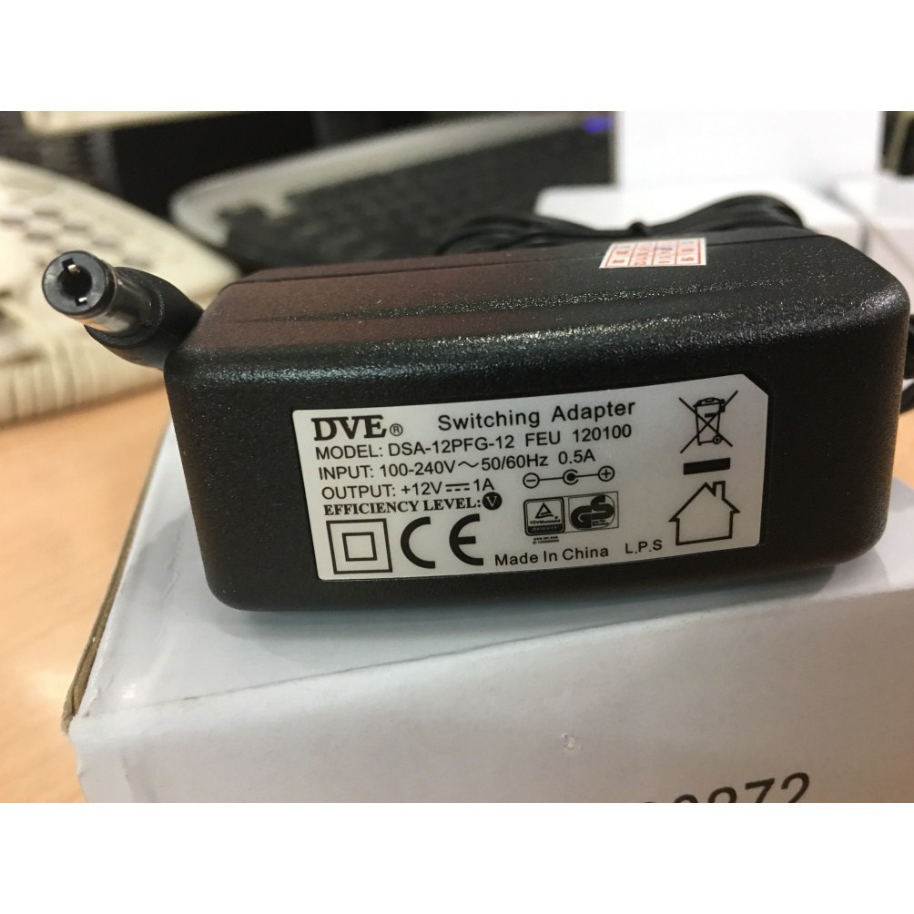 KM -  Nguồn DVE 12 V-1A - Chính hãng dùng cho camera, modem wifi, tủ báo động...Bảo hành : 12 tháng lỗi 1 đổi 1