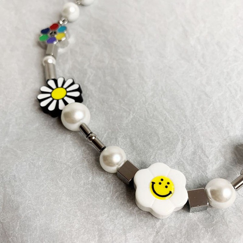 Dây chuyền/Vòng tay mặt hoa cúc và mặt cười làm từ thép titan cao cấp