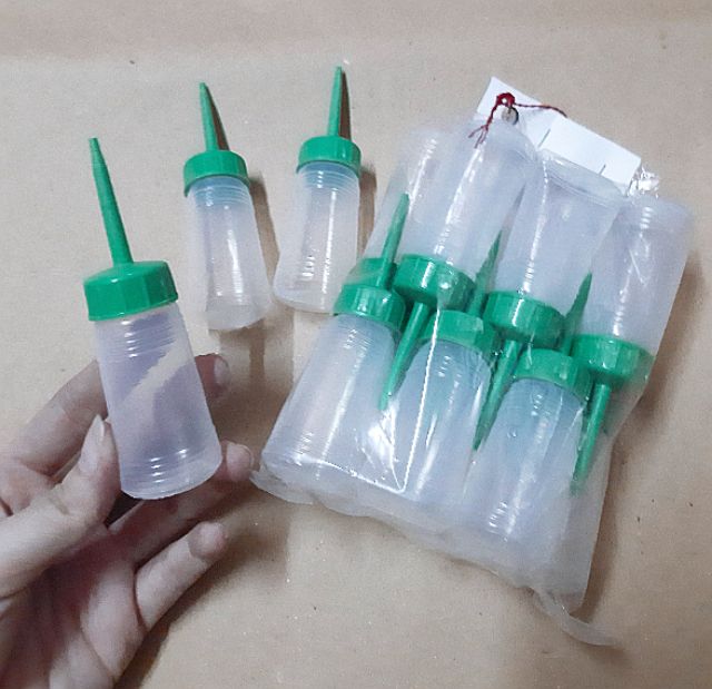 1 Lốc 12 Chai Nhựa Nhỏ 30ml Chiết Keo Sữa , Chất lỏng ....