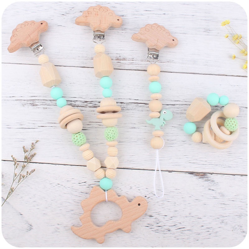 Vòng Tay Chuỗi Hạt Lục Lạc Hình Khủng Long Dễ Thương Cho Bé