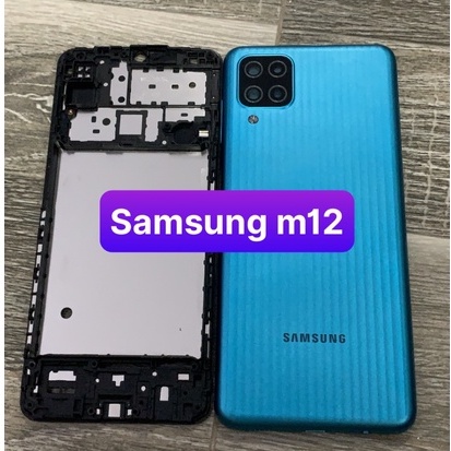 Bộ vỏ samsung M12 -zin ( gồn sườn,lưng,phím bấn,kính cam)
