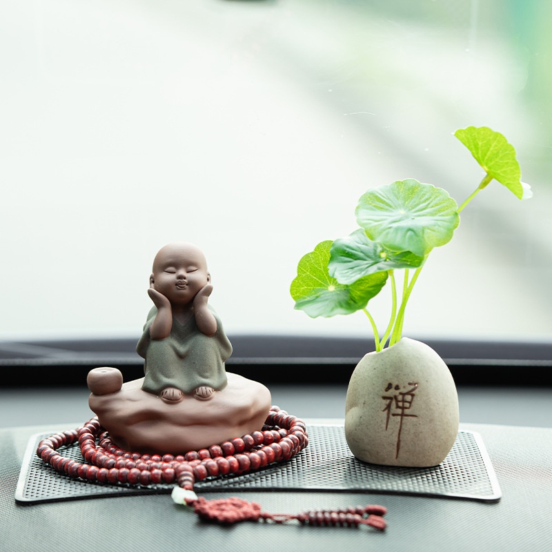 Tượng chú tiểu bằng gốm tử sa