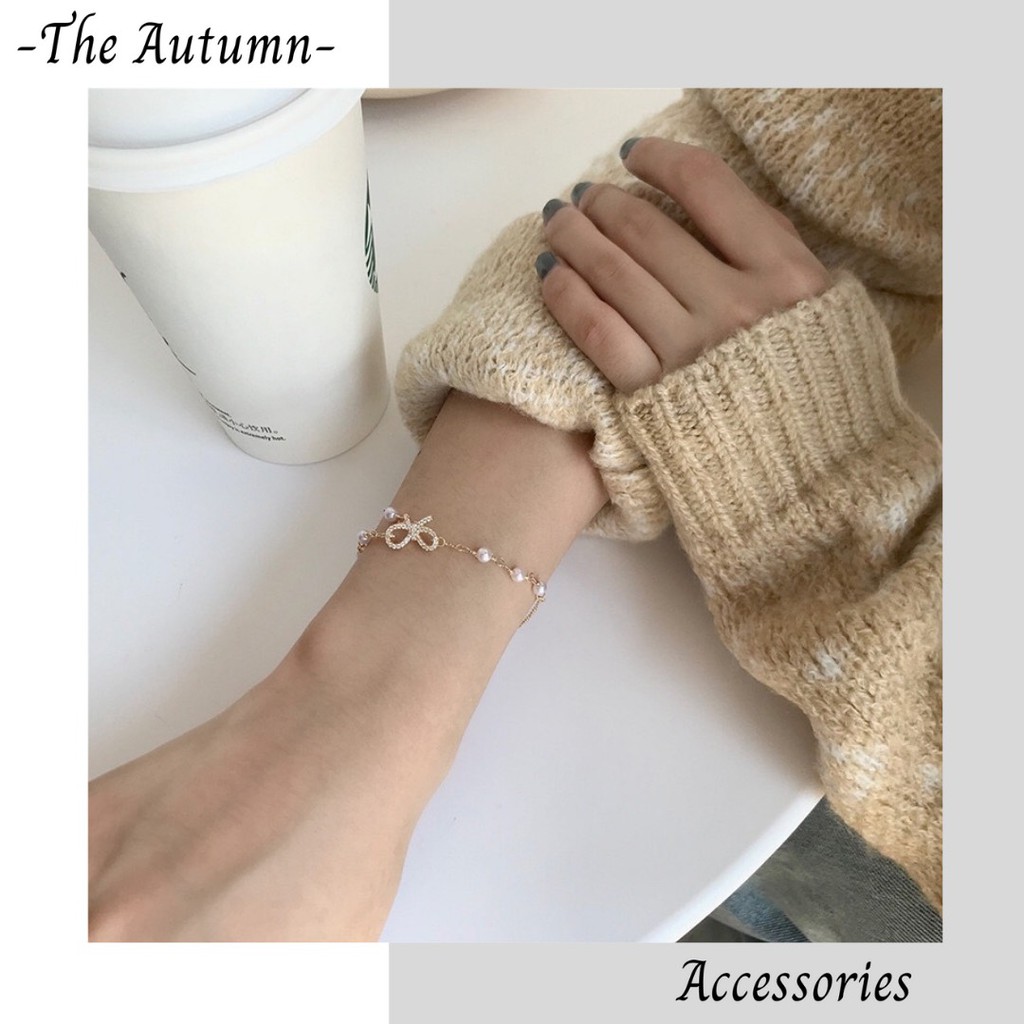 Vòng tay mạ vàng đính ngọc trai nhân tạo hình nơ phong cách hot trend Hàn Quốc cho nữ - The Autumn Accessories