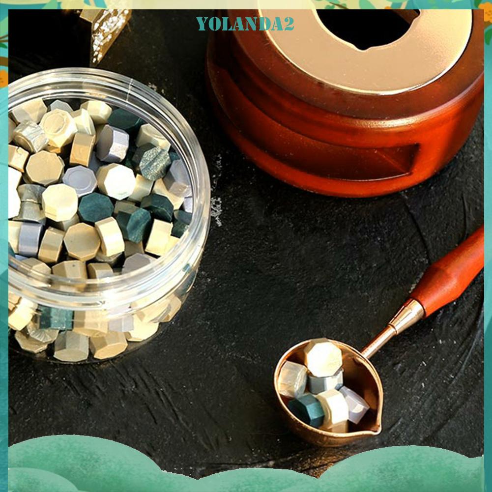 Muỗng nấu chảy sáp cán gỗ tiện dụng