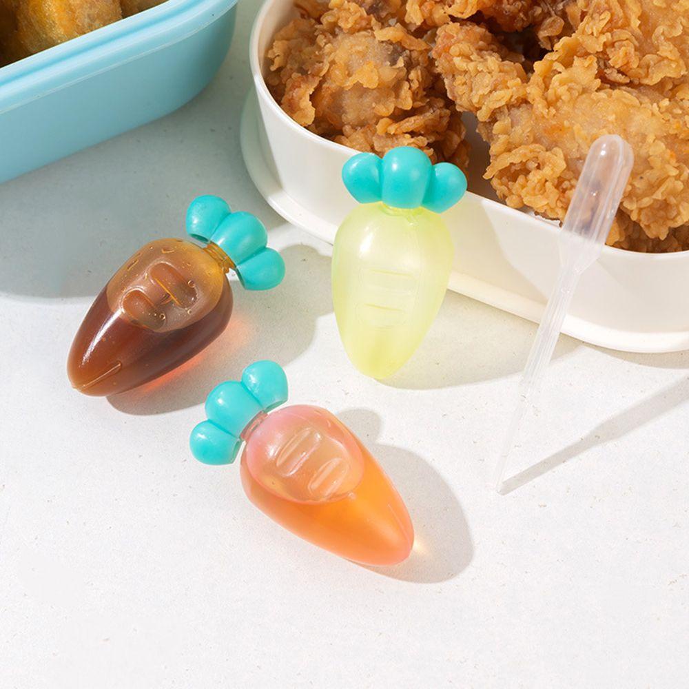 Bình Đựng Nước Sốt Mini Dạng Bóp Hình Củ Cà Rốt Hoạt Hình Cho Trẻ Em