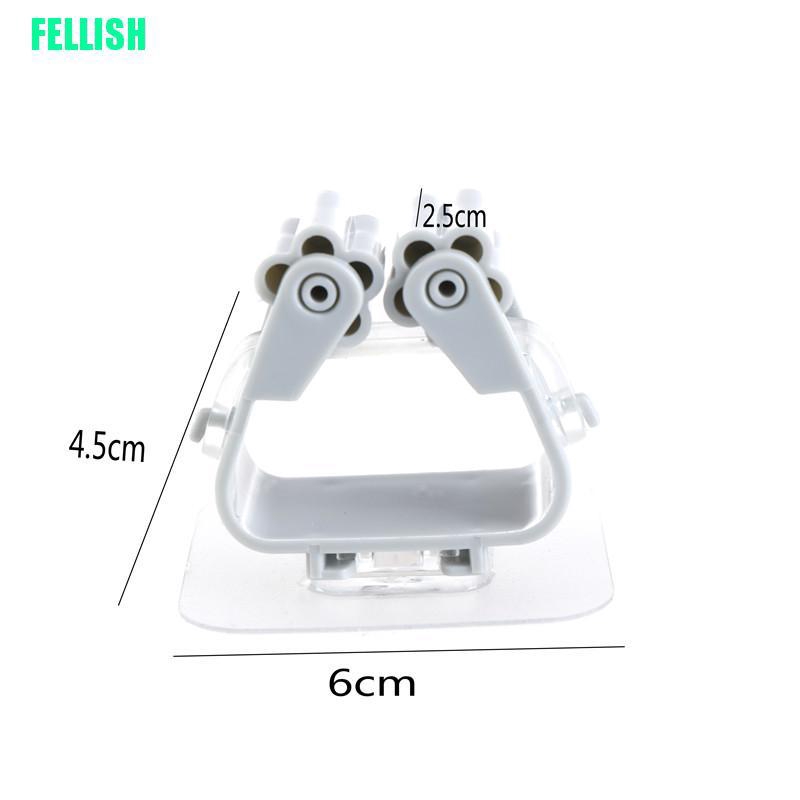 Giá treo cây lau nhà dán tường tiện lợi