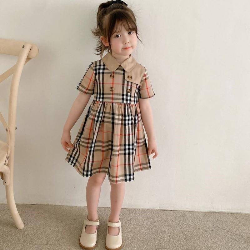 Đầm thời trang Anh Quốc hoa văn caro chất liệu cotton tay ngắn thiết kế 2 hàng nút phong cách công chúa