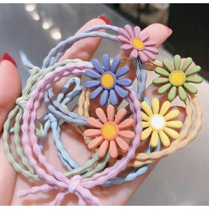 Cột tóc hoa cúc nhiều màu