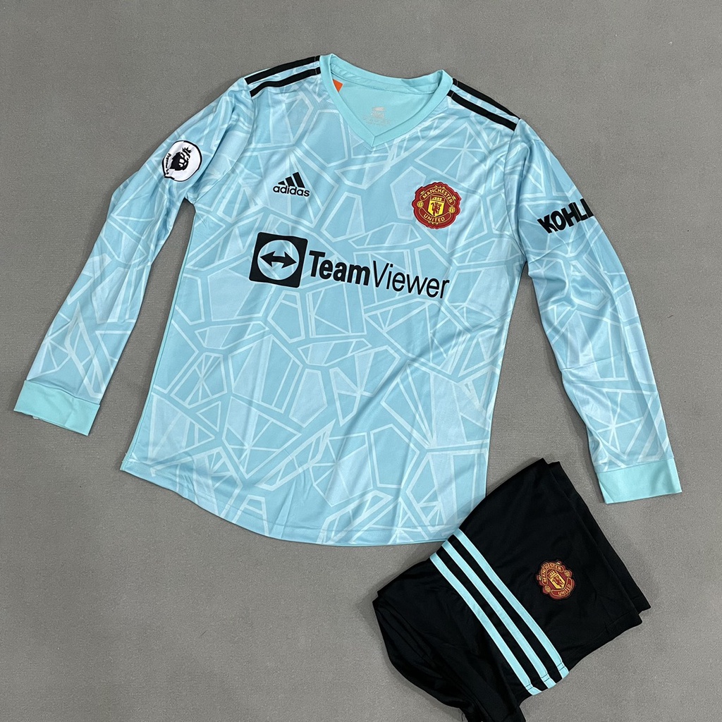 Bộ quần áo đá banh MU Xanh ngọc TM thiết kế Zuka tay dài FLG