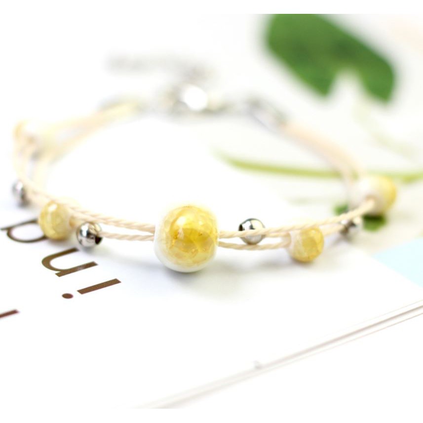 Vòng tay hạt gốm 3 sợi