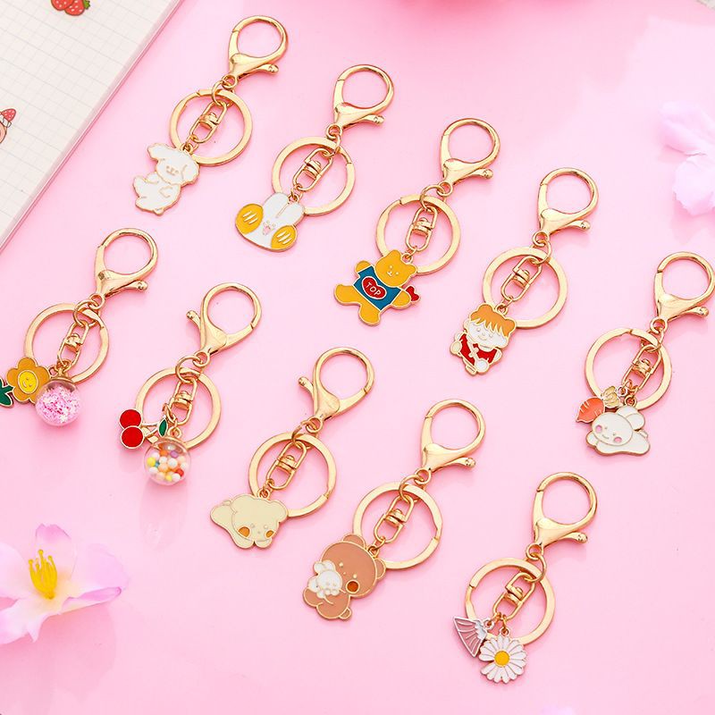 Móc khóa kim loại hình cute.